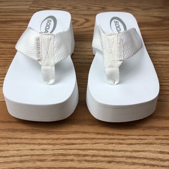 soda white platform flip flops